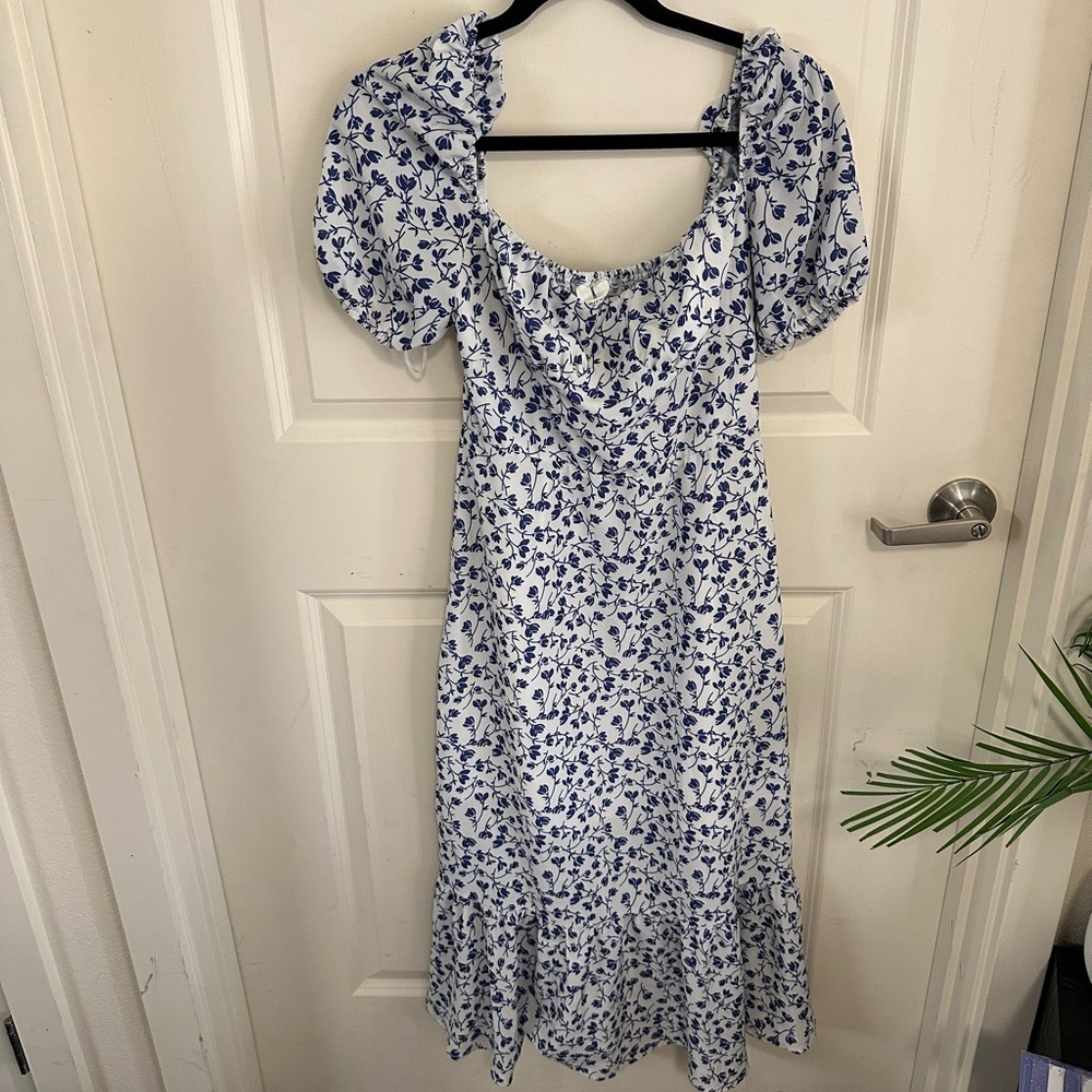 Woman’s below the knee dress